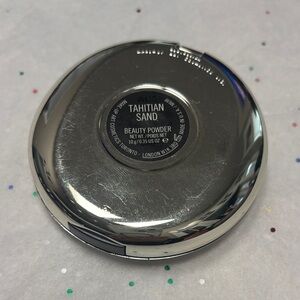 “Tahitian Sand” Beauty Powder Compact
Catherine Deneuve X MAC